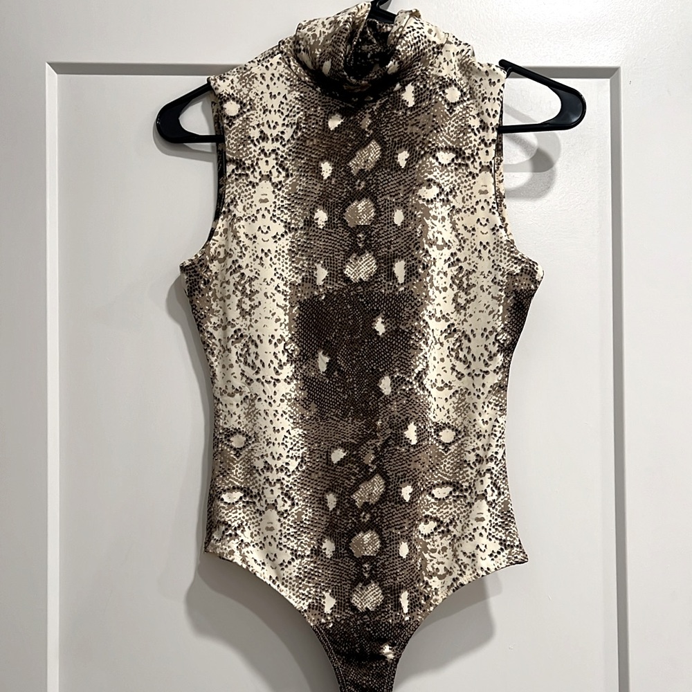 Turtle neck body suit never worn